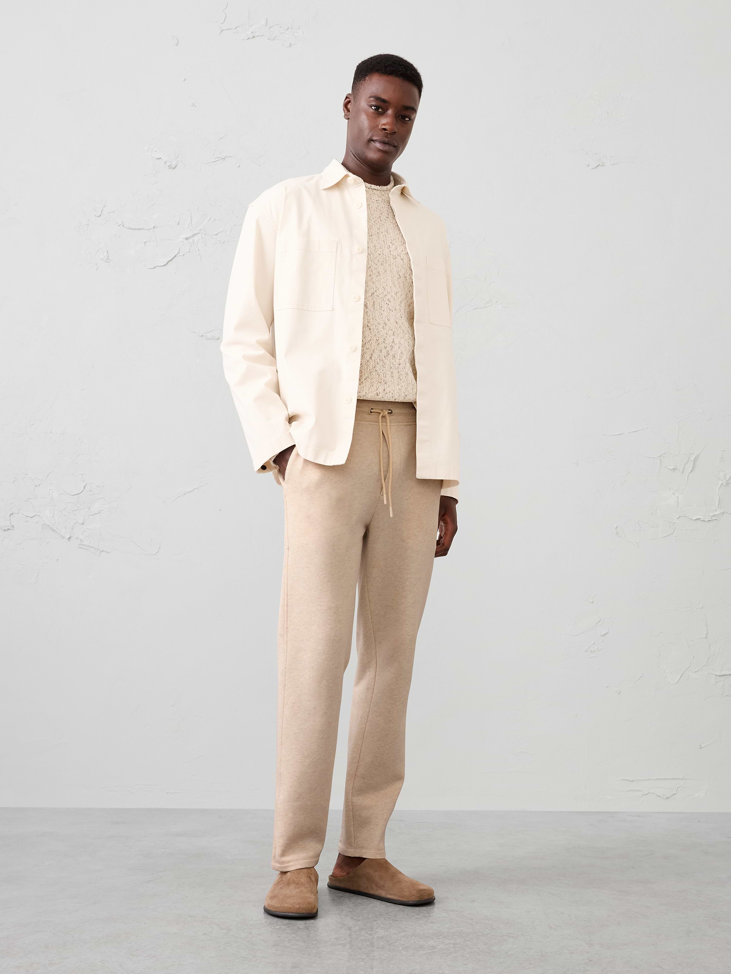 Image 1 of 5, Crafted from soft fleece for exceptional comfort, this sweatpant is designed for effortless everyday wear. Easy, versatile, and comfortable, it’s the perfect choice for relaxing at home, running errands, or casual weekends., Elastic waistband with adjustable drawstring., Faux fly detail., Side seam pockets., Single back patch pocket., Made exclusively for Banana Republic Factory., Product #1179692
