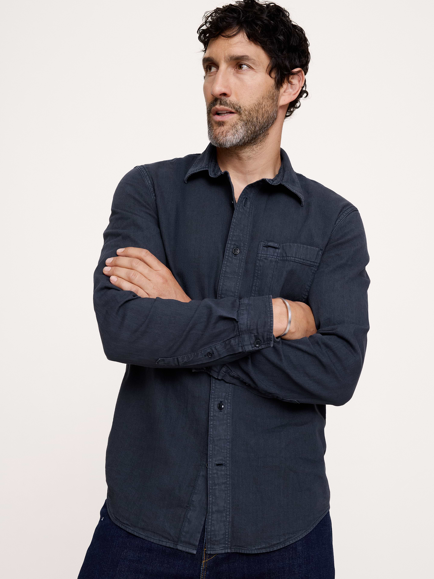 Image 1 of 7, The quintessential chambray shirt, this all-year favorite shirt is crafted in our 100% cotton chambray that is specially washed for added softness., Standard fit: A straight and easy fit., Point collar with button front., Chest pocket with glasses loop., Shirttail hem., Product #906443