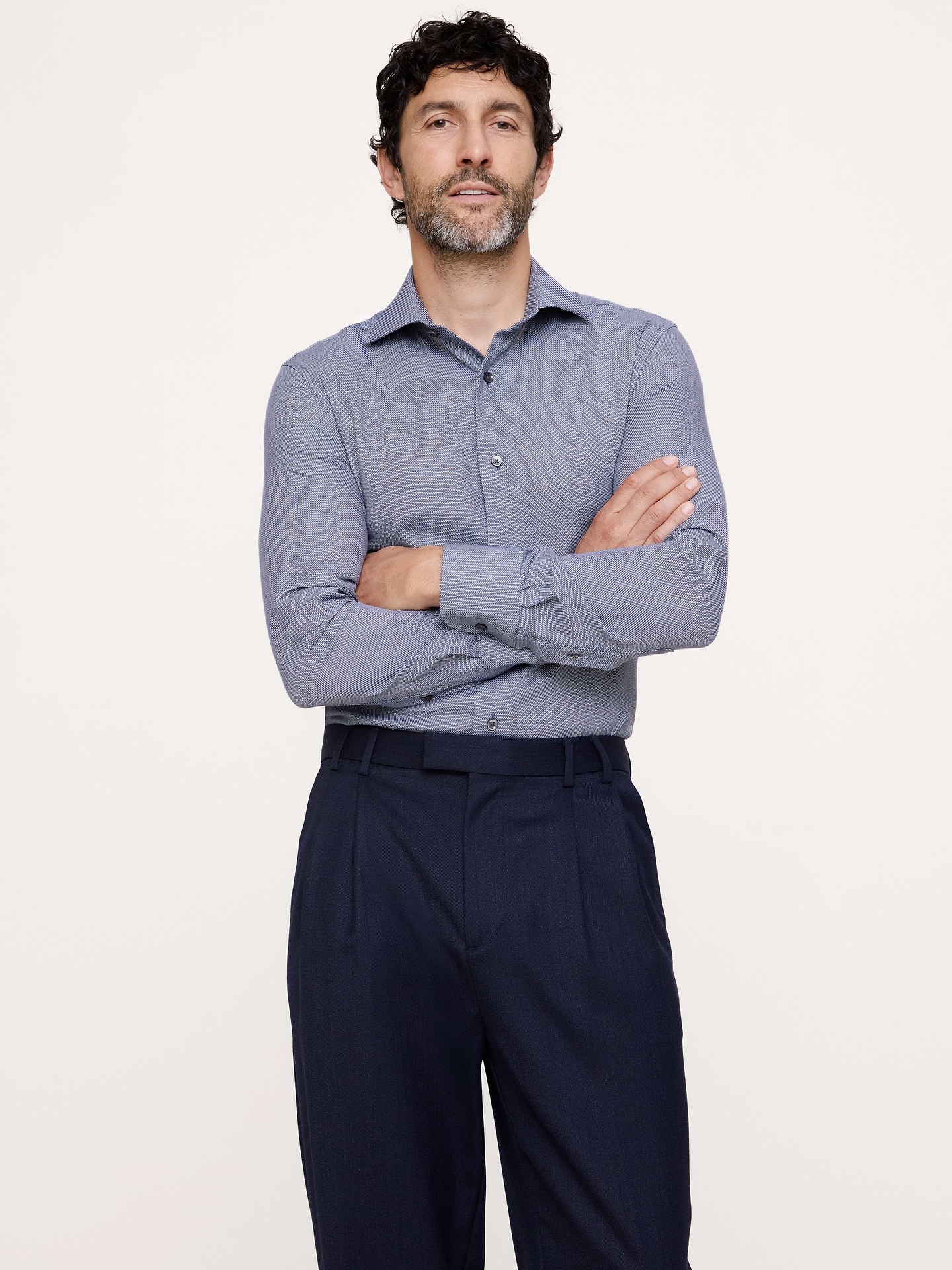 Image 1 of 6, We sourced an incredible fabric for this dress shirt, selecting one woven with a base of breathable cotton, blended with a touch of cashmere for softness and warmth., Slim Fit: Fitted. Sits close to the body with a straight silhouette., Cutaway collar with button-front closure., Shirttail hem., Product #906459
