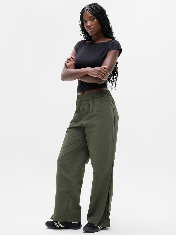 Image 1 of 6, FOR: Commuting, work, and travel, FEEL: Sleek and lightweight with a cool hand-feel, FAVE: Zip-adjustable leg for an easy switch between straight and wide silhouettes, Zip pockets secure your essentials, Product #844604