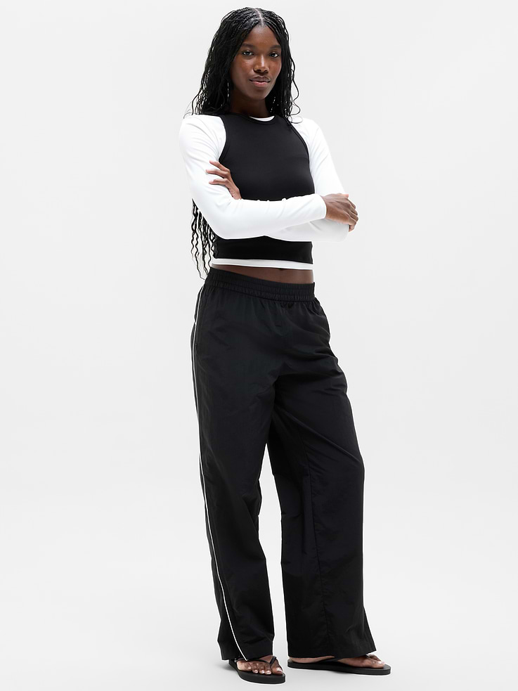 Image 1 of 6, FOR: Commuting, work, and travel, FEEL: Sleek and lightweight with a cool hand-feel, FAVE: Zip-adjustable leg for an easy switch between straight and wide silhouettes, Zip pockets secure your essentials, Product #844604