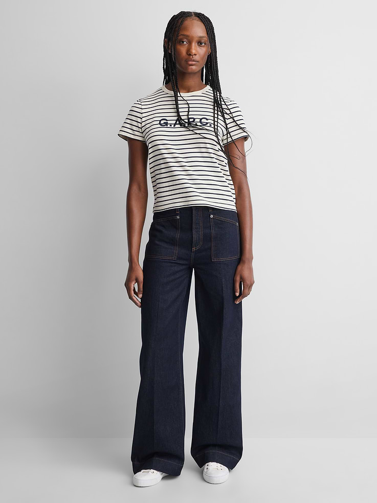 Image 1 of 9, Fit: Fitted in the waist & hips with a full-length, relaxed wide leg., Fabric: 100% Regenerative Cotton., Stretch: Rigid Jeans. Authentic, non-stretch denim that gets better with every wear. Made to wear all day & break in over time., Rise: High Rise Jeans., Look: A wide-leg jean in a rinse wash., Details: Logo button closure, zip fly, four-pocket styling, logo leather patch at back, and logo rivets., Responsibly Made: This jean is part of our water-saving Washwell program. Compared with conventional wash methods, Washwell uses at least 20% less water., More Sustainable Cotton: Made with 100% regeneratively grown cotton which is grown using holistic agricultural practices that aim to improve soil health and water retention., Product #1179758