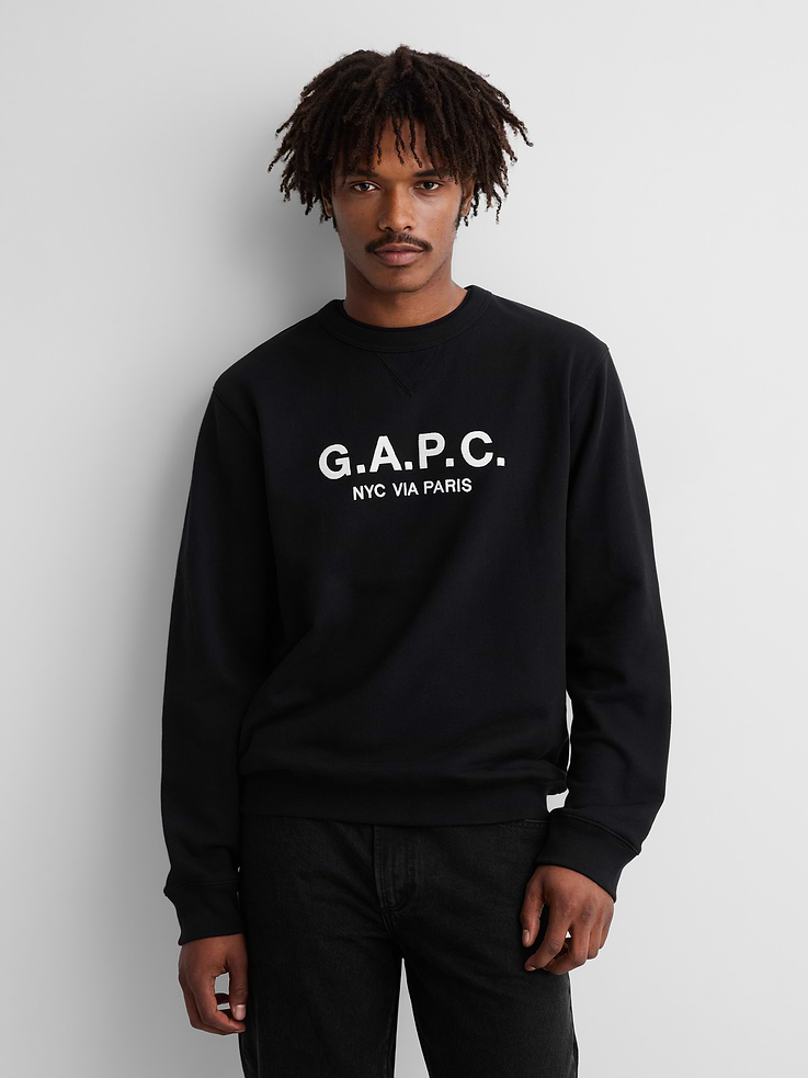 Image 1 of 6, Soft, heavyweight French terry sweatshirt. In an oversized fit., Crewneck., Long sleeves with dropped shoulders., Gap x A.P.C. logo at front., Banded hem and cuffs., Made with 14% recycled polyester. Compared to virgin materials, using recycled materials helps reduce resource use and waste., Product #1179800