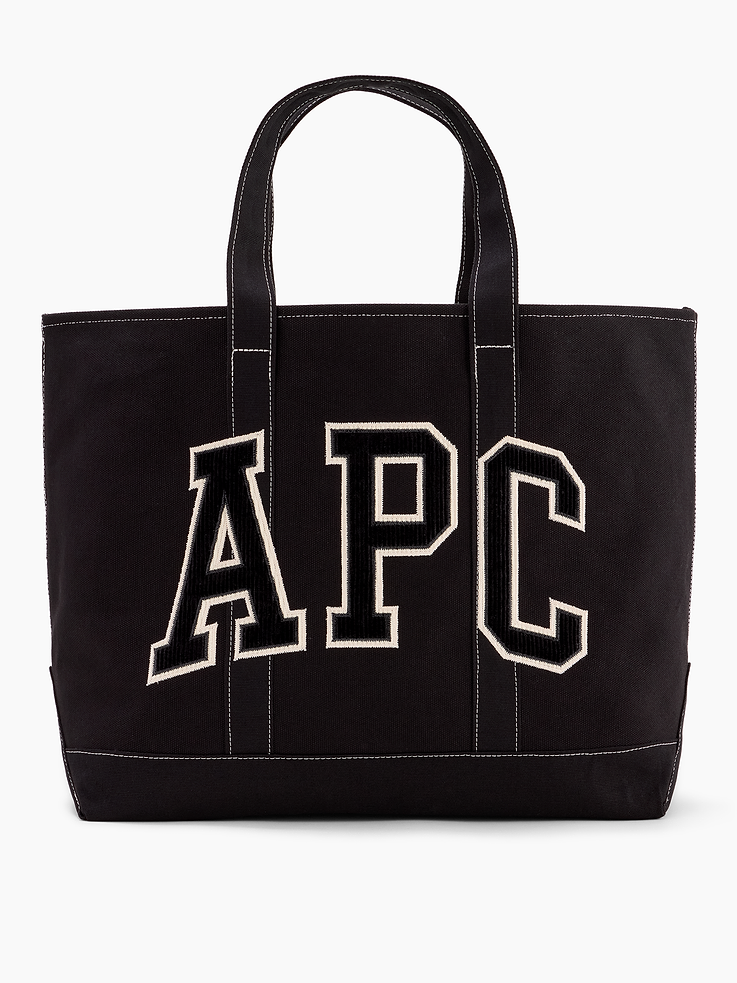 Image 1 of 4, Sturdy cotton canvas tote bag., Handles at top., A.P.C. corduroy arch logo at front., Gap patch logo at back., Front pocket., Product #1179745