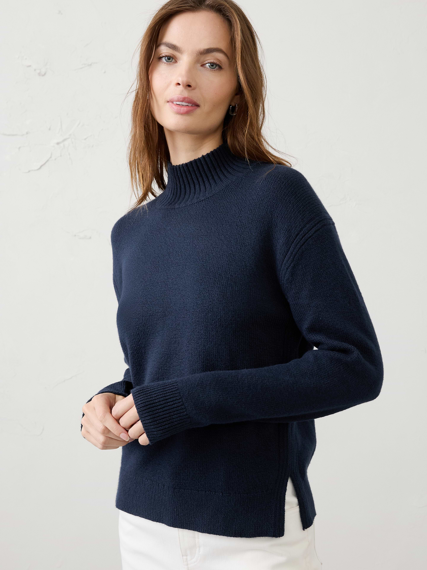 Image 1 of 3, Designed to be a go‑to layering essential, this sweater offers a soft, warm hand feel with lightweight comfort that never feels bulky. Cozy and versatile, it's perfect for transitional weather, whether worn on its own or layered under jackets and outerwear. Effortlessly polished and easy to style, it's a piece you'll reach for season after season., Mock neckline. Long sleeves., Drop shoulders., Ribbed neckline, arm cuffs and hem., Side seam slits at hem., Made exclusively for Banana Republic Factory., Product #1177078