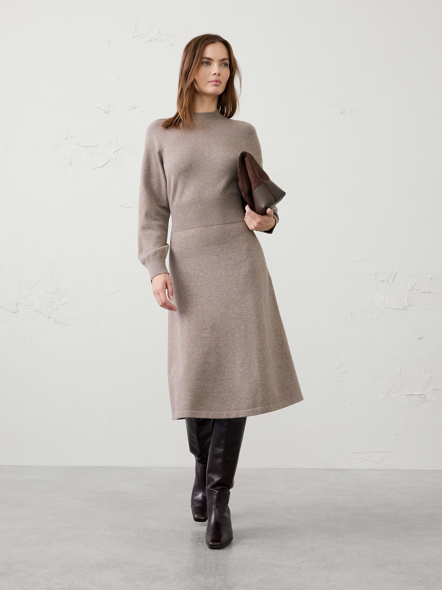 Image 1 of 3, A cozy turtleneck and defined ribbed waist create a flattering silhouette that’s both comfortable and refined. Soft and easy to wear, this midi sweater dress delivers effortless sophistication for workdays, weekends, and everything in between., Ribbed turtleneck. Long raglan sleeves with extended ribbed cuffs., Wide ribbed waistband defines the waist and creates a flattering silhouette., Flared skirt., Made exclusively for Banana Republic Factory., Product #1185670