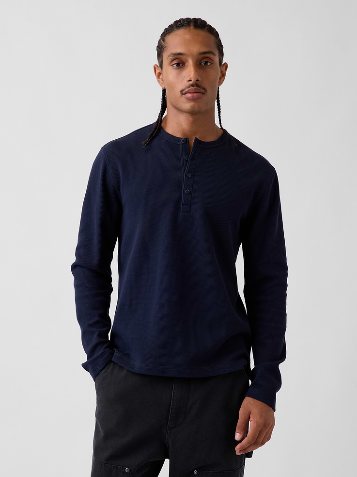 Image 1 of 5, Soft, waffle-knit stretch cotton Henley T-shirt., Crewneck with front button placket., Long sleeves., This product was made in a factory that invests in gender equity and women’s empowerment through RISE. Learn more at gapinc.com/equity ., Product #1185662