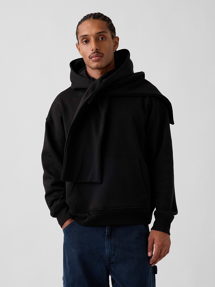 Image 1 of 8, Soft cotton-blend fleece hoodie. In a universally oversized fit., Hooded neckline with scarf detailing., Long sleeves., Kanga pocket., Banded hem and cuffs., Made with 23% recycled polyester. Compared to virgin materials, using recycled materials helps reduce resource use and waste., Product #1186441
