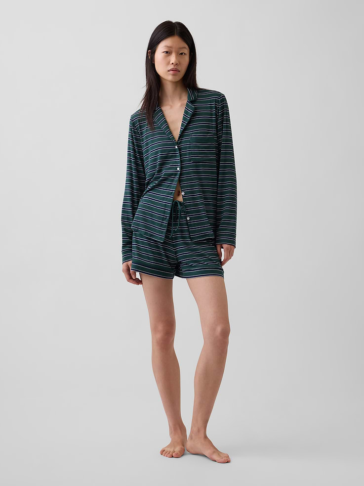 Image 1 of 6, The modal PJs of your dreams. Buttery soft. Naturally cool. With a little stretch. For sleeping, lounging, comfortably., Soft, stretch modal-blend pajama sleep shorts., Elasticized waist with drawcords., Piping allover., Certain styles have allover prints., This product was made in a factory that invests in gender equity and women’s empowerment through RISE. Learn more at gapinc.com/equity ., Product #728674