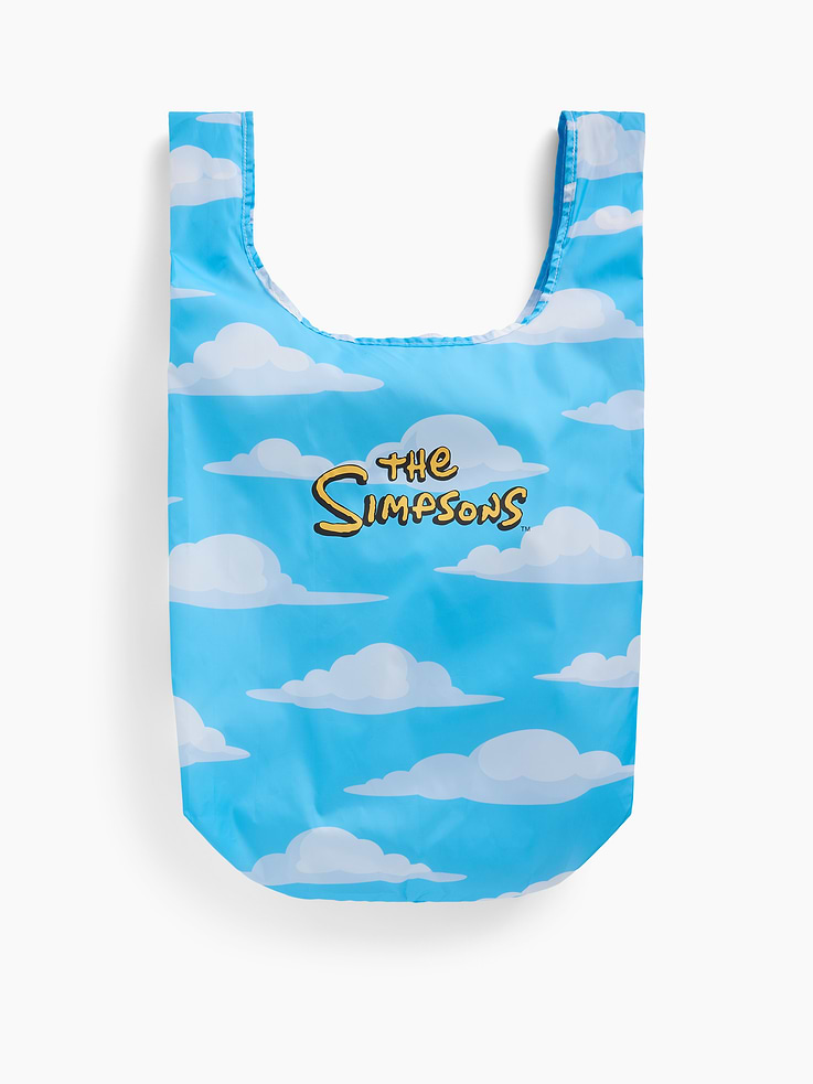 Image 1 of 4, Smooth packable polyester tote bag with packable pocket., Double handles at top., Allover graphics and The Simpsons logo at front., Metal key ring and Homer Simpson graphic at packable pocket., Product #907433