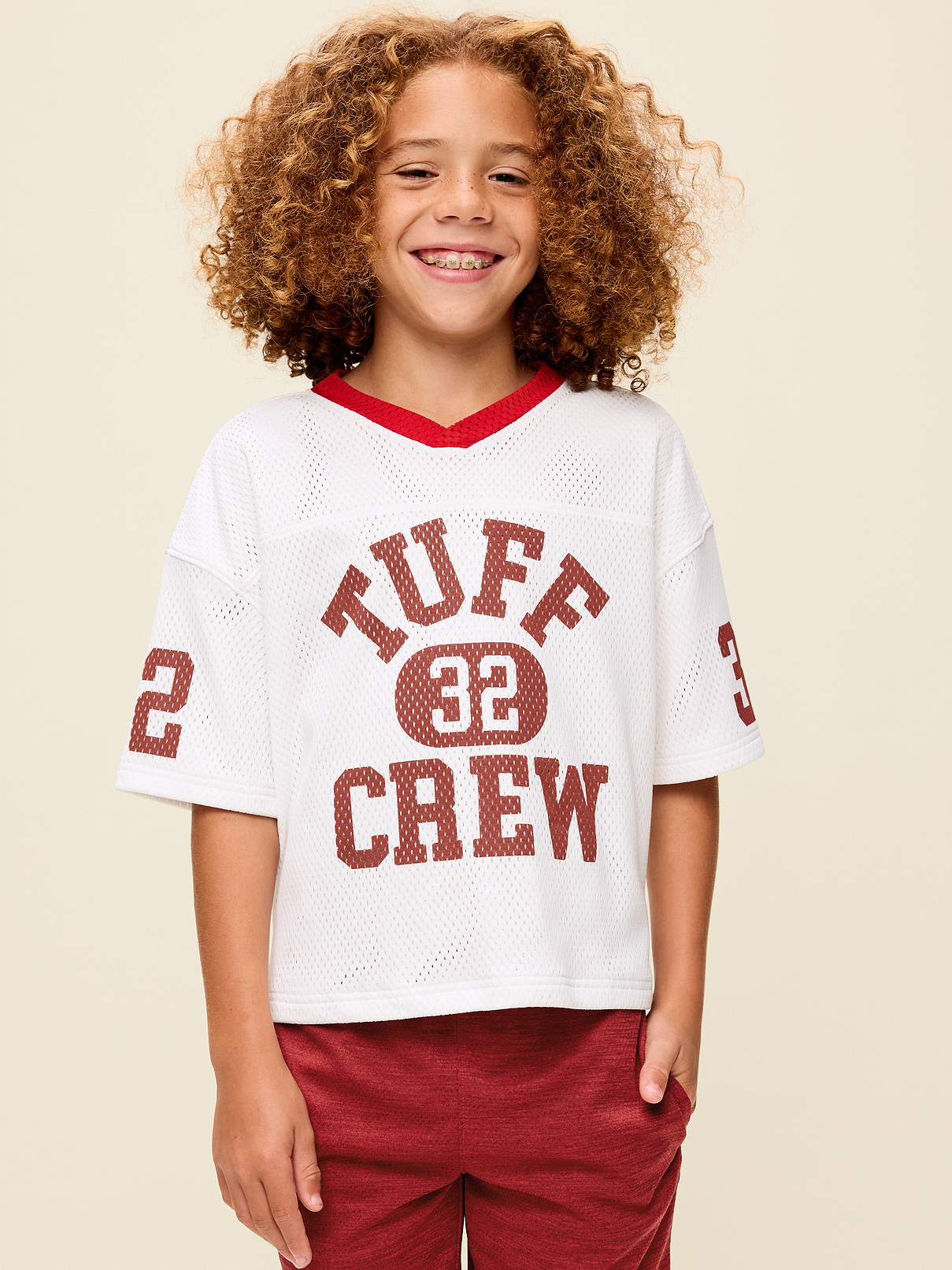 Image 1 of 2, v neck, short sleeves, drop shoulders, graphic at front, Product #906056