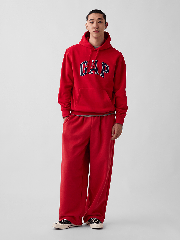 Image 1 of 6, Our softer than soft sweats. Brushed on the inside. Smooth on the outside. Made so that no two are alike., Soft cotton-blend fleece baggy sweatpants., Elasticized waist with inner drawcords., Side welt pockets, back patch pocket., Made with 23% recycled polyester. Compared to virgin materials, using recycled materials helps reduce resource use and waste., This product was made in a factory that invests in gender equity and women’s empowerment through RISE. Learn more at gapinc.com/equity ., Explore our GapSweats Guide ., Product #853419