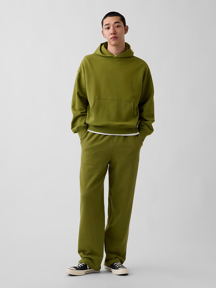 Image 1 of 6, Soft, heavyweight cotton-blend fleece sweatpants. In a relaxed fit., Elasticized waist with inner drawcords., Side slant pockets, back welt pockets., Made with 14% recycled polyester. Compared to virgin materials, using recycled materials helps reduce resource use and waste., Product #912706