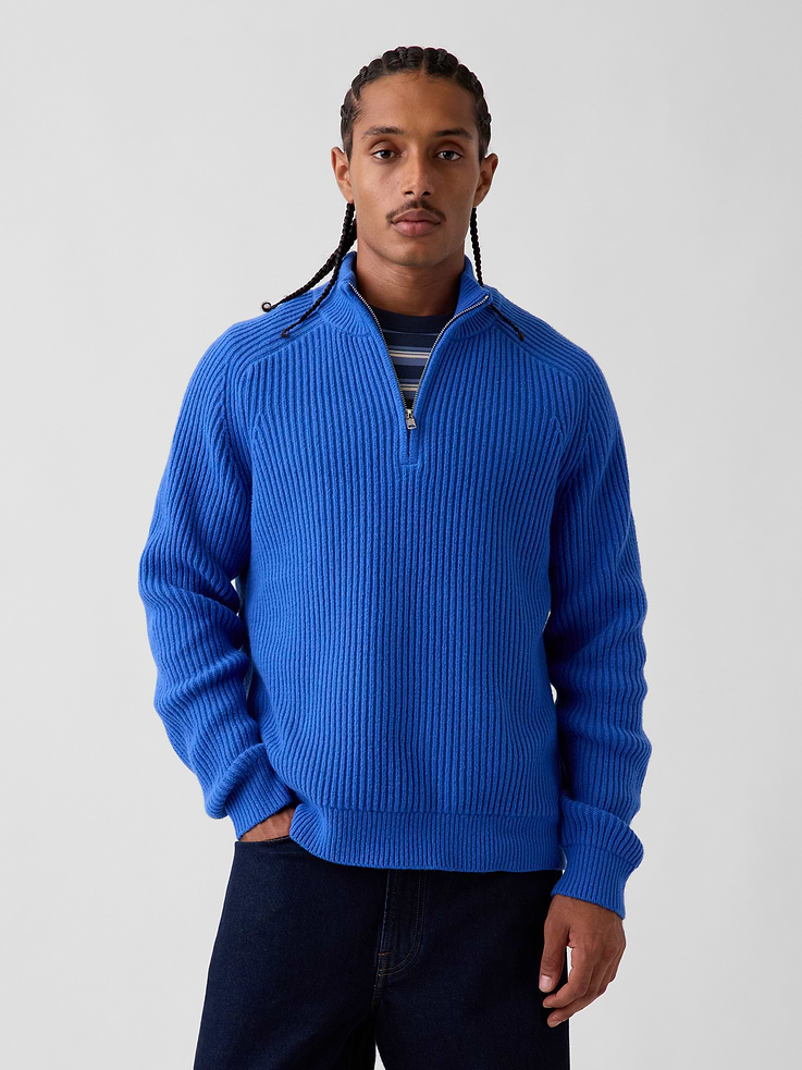 Image 1 of 5, Supersoft, ribbed knit cotton-blend pullover sweater., Mockneck with quarter-zip closure., Long sleeves with saddle shoulders., Banded cuffs and hem., This product was made in a factory that invests in gender equity and women’s empowerment through RISE. Learn more at gapinc.com/equity ., Product #914524