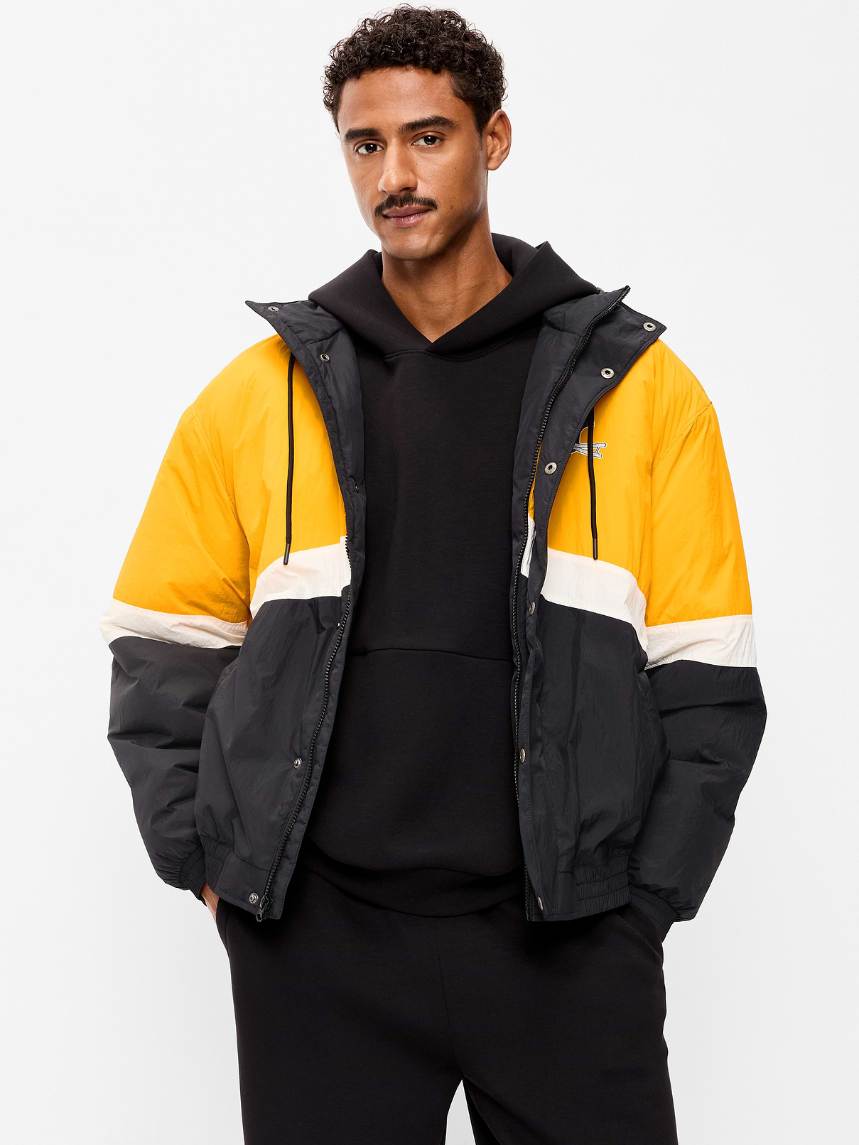 Image 1 of 7, built-in drawstring hood, long sleeves, full length zipper, graphic at front, welt pockets, Product #916233