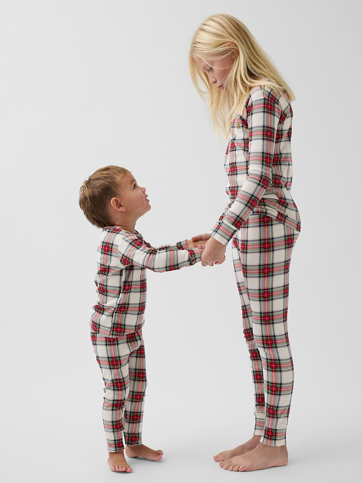 Image 1 of 6, Our comfiest PJs—now softer than ever. Cozy brushed cotton on the inside. All their favorite prints & colors on the outside., Soft cotton pajama top and pants PJ set with a cozy brushed interior., Crewneck., Long sleeves., Embroidered Brannan Bear at chest., Elasticized waist at PJ pants., Banded cuffs., Allover plaid print., Made with 100% organically grown cotton, which is grown without the use of synthetic pesticides and fertilizers., Note: Sizing for select prints extends up to 12 YRS., Shop matching PJs for all., Product #912954
