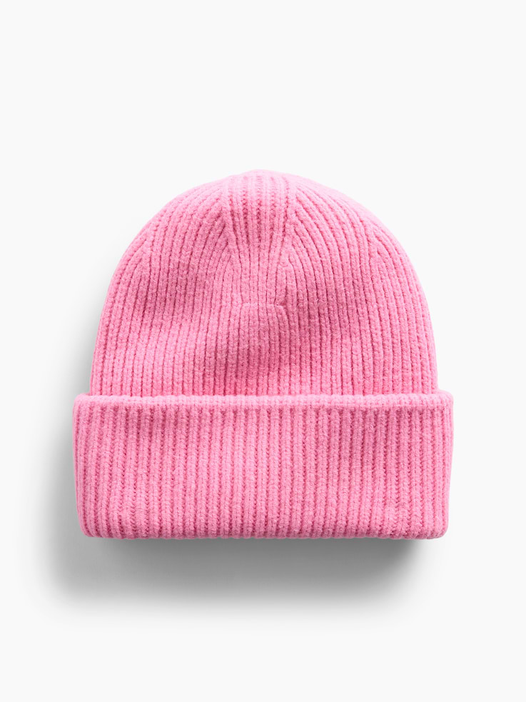 Image 1 of 2, Soft, chunky knit cotton-blend beanie., Rolled brim., This product was made in a factory that invests in gender equity and women’s empowerment through RISE. Learn more at gapinc.com/equity ., Product #1185040