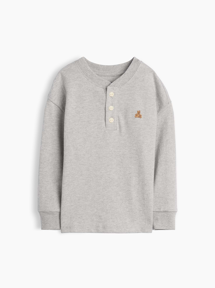Image 1 of 2, Soft cotton jersey Henley T-shirt., Crewneck with front button placket., Long sleeves with drop shoulders and banded cuffs., Embroidered Brannan Bear at chest., Product #915340