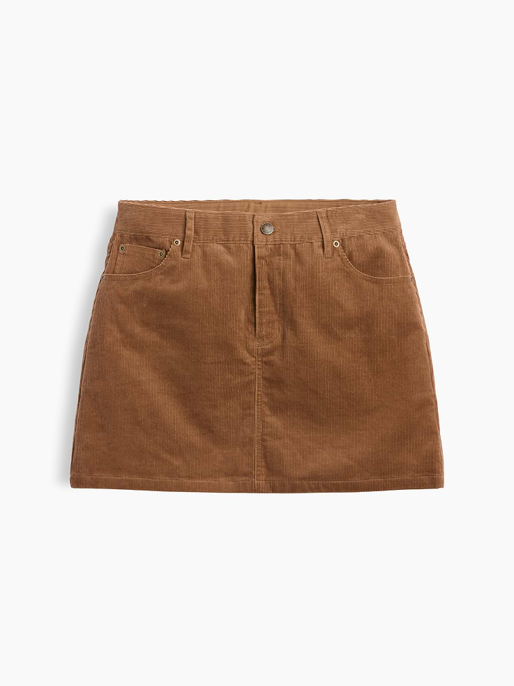 Image 1 of 2, Soft, stretch cotton corduroy mini skirt., Button closure, zip fly., Classic five-pocket styling., This product was made in a factory that invests in gender equity and women’s empowerment through RISE. Learn more at gapinc.com/equity ., Product #1184726
