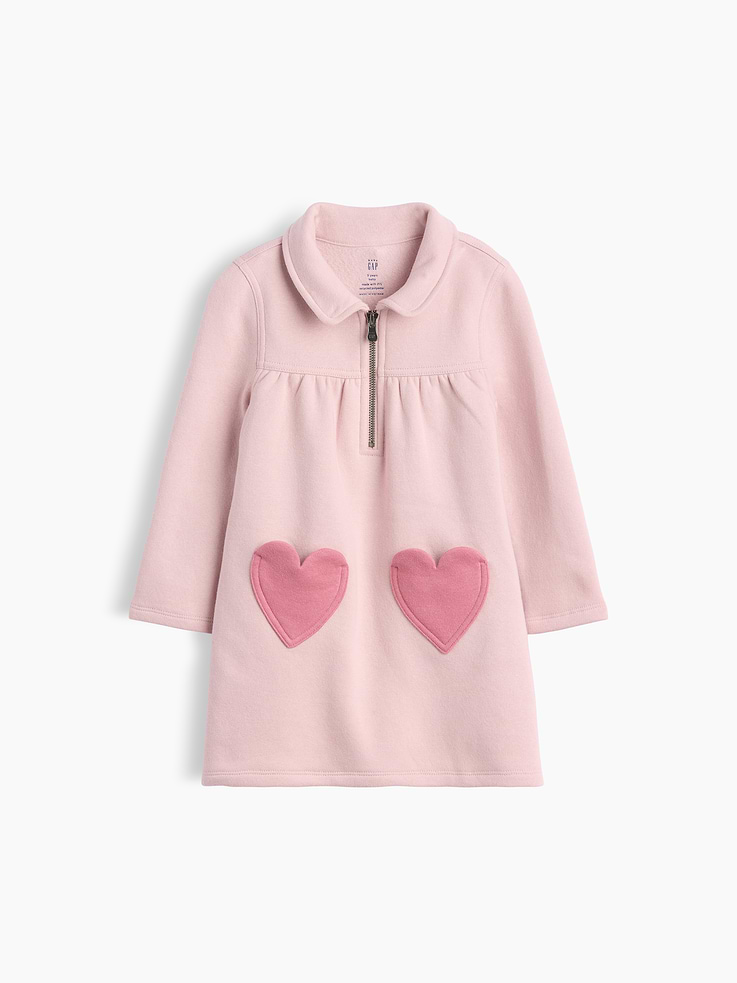 Image 1 of 3, Soft cotton-blend fleece sweatshirt dress., Peter Pan collar with front zipper placket., Long sleeves., Shirring at empire waist seam., Heart-shaped patch pockets at front., Made with 21% recycled polyester. Compared to virgin materials, using recycled materials helps reduce resource use and waste., Product #912138