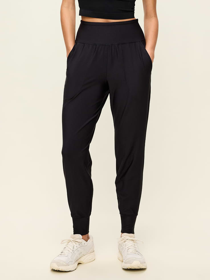 Image 1 of 11, Featuring PowerSoft. Light compression meets a peachy-smooth, sweat-wicking fabric., new waistband has more hold, less pinching, pockets fit your phone, banded cuffs, go-dry wicks moisture, breathable, available in maternity sizes, Product #479566