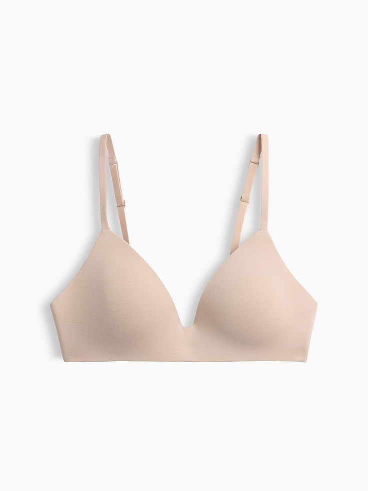 Image 1 of 1, A foundation of comfort — made exceptionally soft., Soft, lightweight stretch modal wireless T-shirt bra., V-neck., Adjustable spaghetti straps., Adjustable hook-and-eye back closures at back., Shop more SoftMade Modal ., This product was made in a factory that invests in gender equity and women’s empowerment through RISE. Learn more at gapinc.com/equity ., Product #909160
