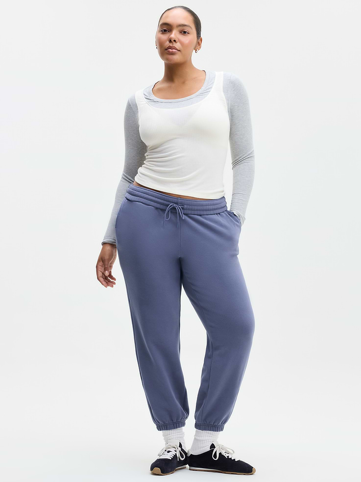 Image 1 of 6, FOR: Lounge and everyday movement, FEEL: Plush stretch fleece has a soft, brushed interior, FAVE: New and improved three-track waistband for extra support, Easy-access pockets to stash your essentials, Product #1174475