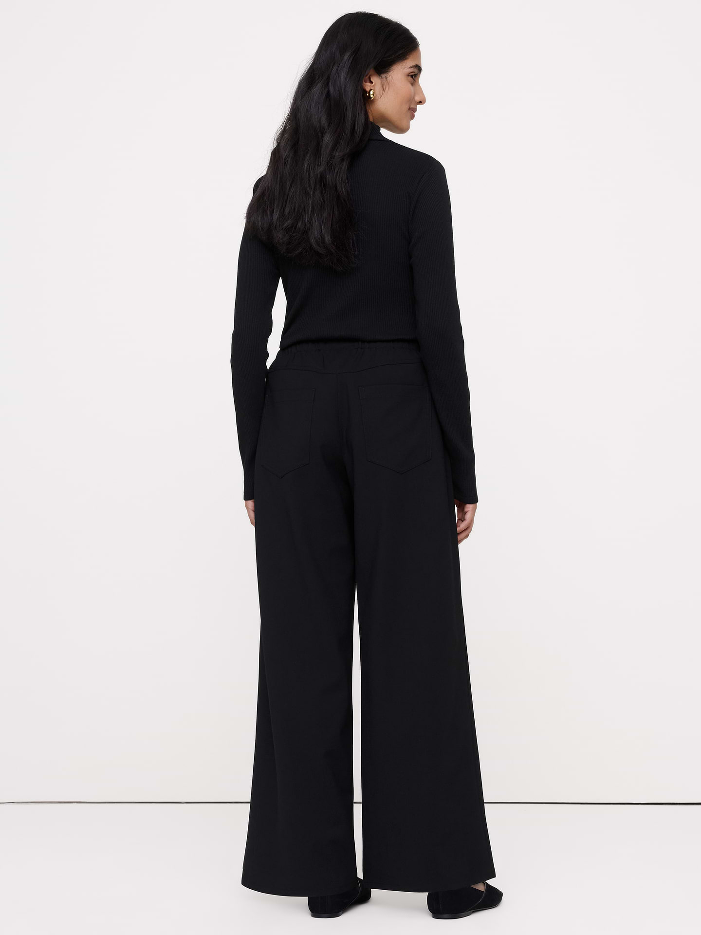 Image 5 of 7, The Studio Wide-Leg Drawstring Pant in Italian Wool.