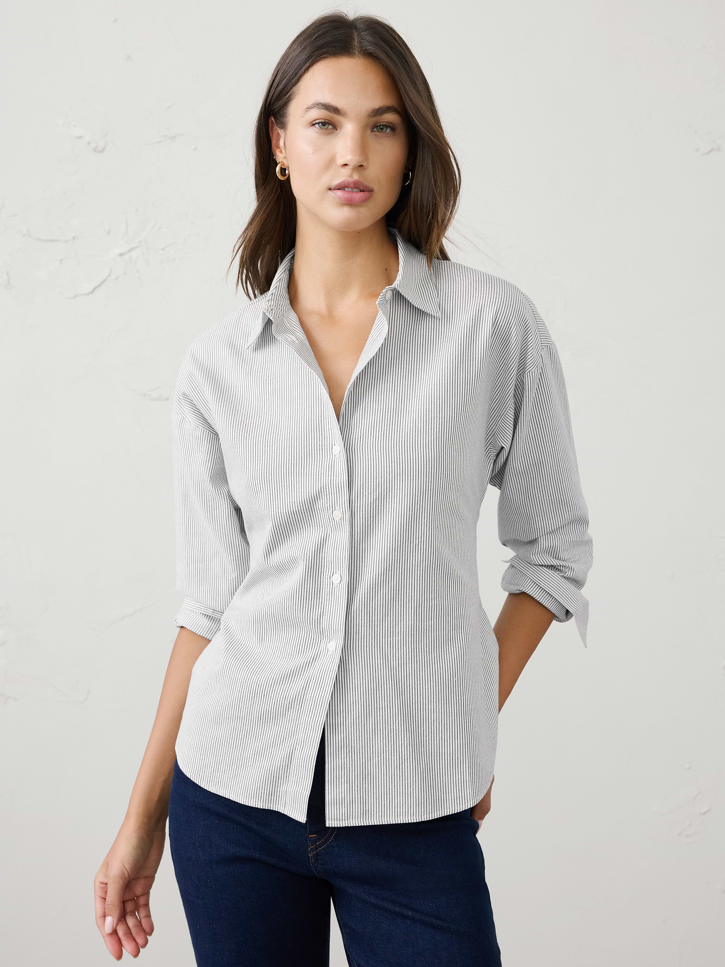 Image 1 of 3, Made from a warm‑handed oxford fabric, this shirt combines classic styling with a modern tie‑back detail. Comfortable and versatile, it's an easy piece for casual winter dressing with a feminine, flattering finish., Pointed collar. Long sleeves with extended cuffs and button closures., Drop shoulders., Button-front closure., Self‑tie detail at the back allows for adjustable shaping., Shirttail hem., Made exclusively for Banana Republic Factory., Product #1185904