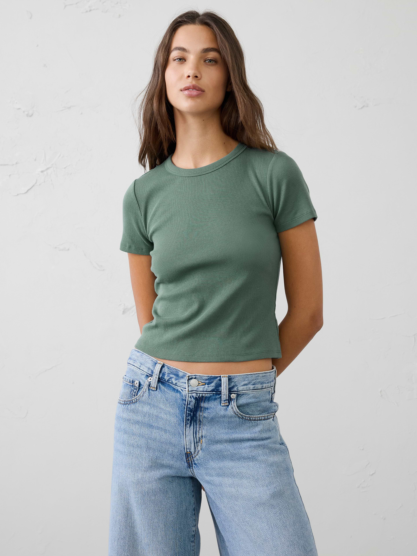 Image 1 of 8, Our top-selling ribbed t-shirt is now designed to sit just above your hip for a modern look., Crew neck. Short sleeves., Straight hem., Made exclusively for Banana Republic Factory., Product #885421