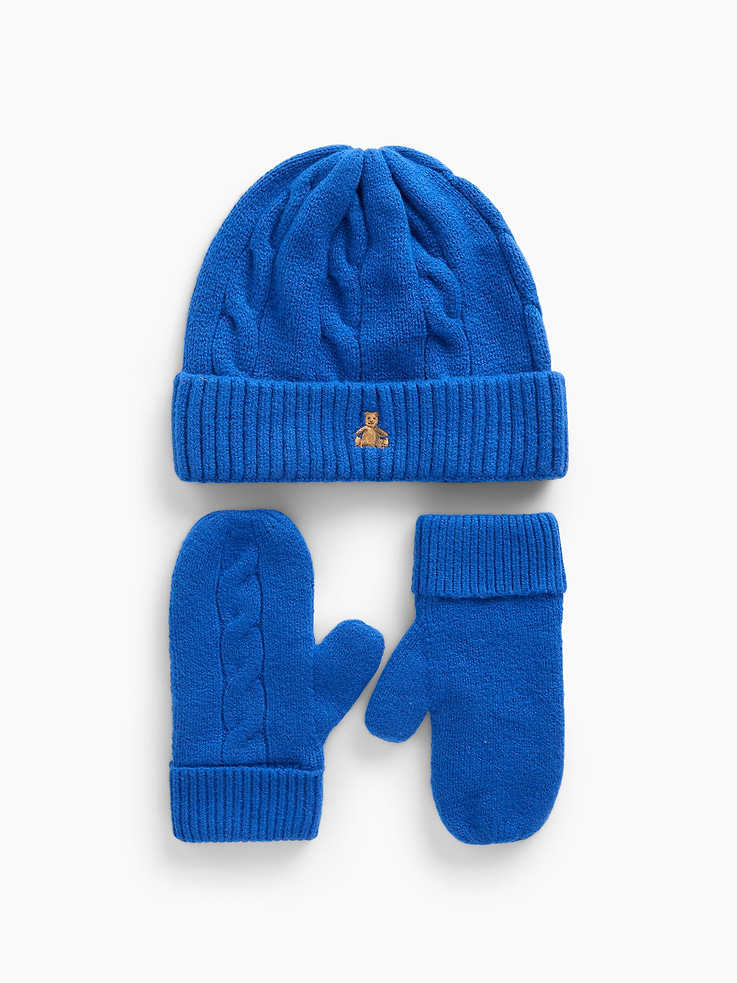 Image 1 of 2, Our bestselling fabric that feels cashmere-soft. Crafted in a midweight plush yarn. Refined with a special brushed technique. It's everyday luxury., Supersoft, cable-knit beanie hat and mittens cold-weather accessories set., Embroidered Brannan Bear at beanie., Ribbed cuffs., Note: Sizes 0-6 months do not feature thumb holes., This product was made in a factory that invests in gender equity and women’s empowerment through RISE. Learn more at gapinc.com/equity ., Product #1184960