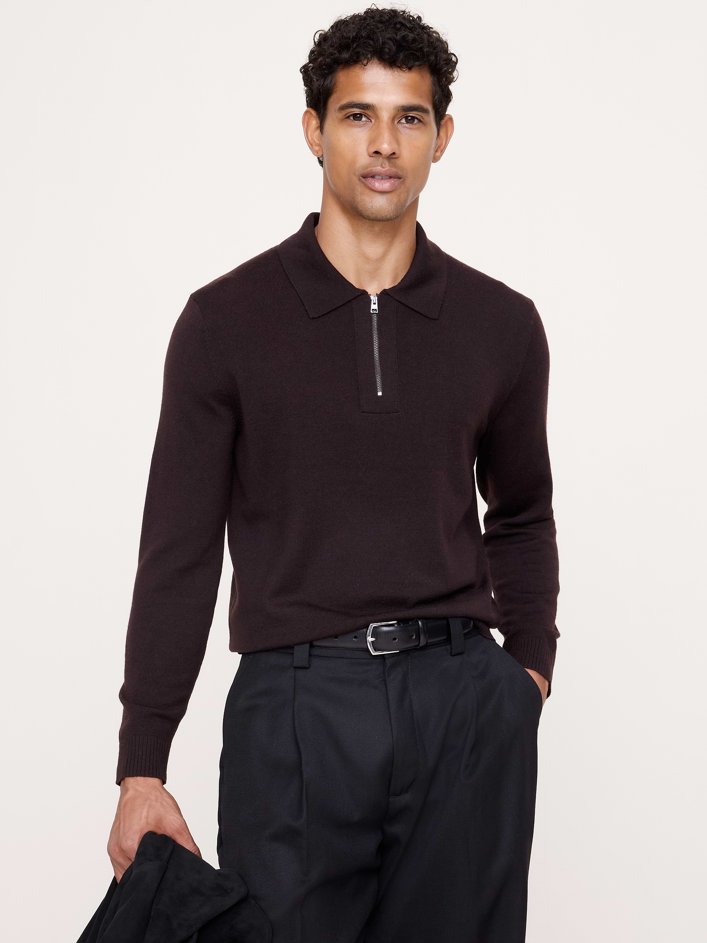 Image 1 of 8, Looks good, feels good. A classic sweater polo, crafted in beautifully warm and soft Merino wool., Standard fit: A straight and easy fit., Point collar with zip closure., Straight hem., Product #906194