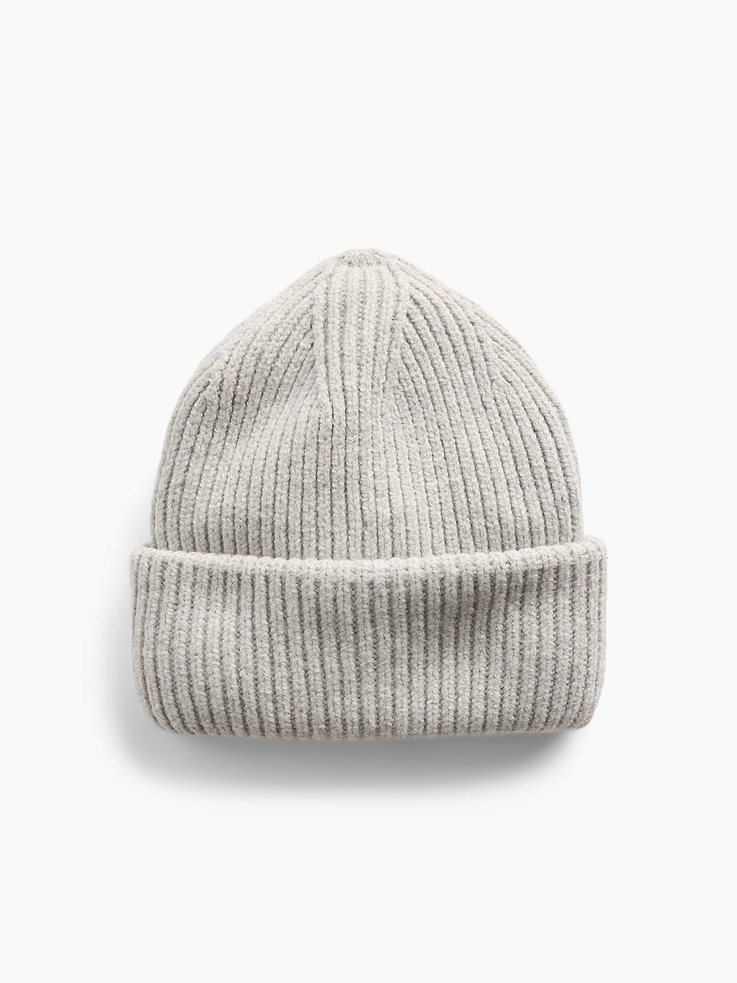 Image 1 of 2, Our bestselling fabric that feels cashmere-soft. Crafted in a midweight plush yarn. Refined with a special brushed technique. It's everyday luxury., Supersoft ribbed knit beanie., This product was made in a factory that invests in gender equity and women’s empowerment through RISE. Learn more at gapinc.com/equity ., Product #1184966