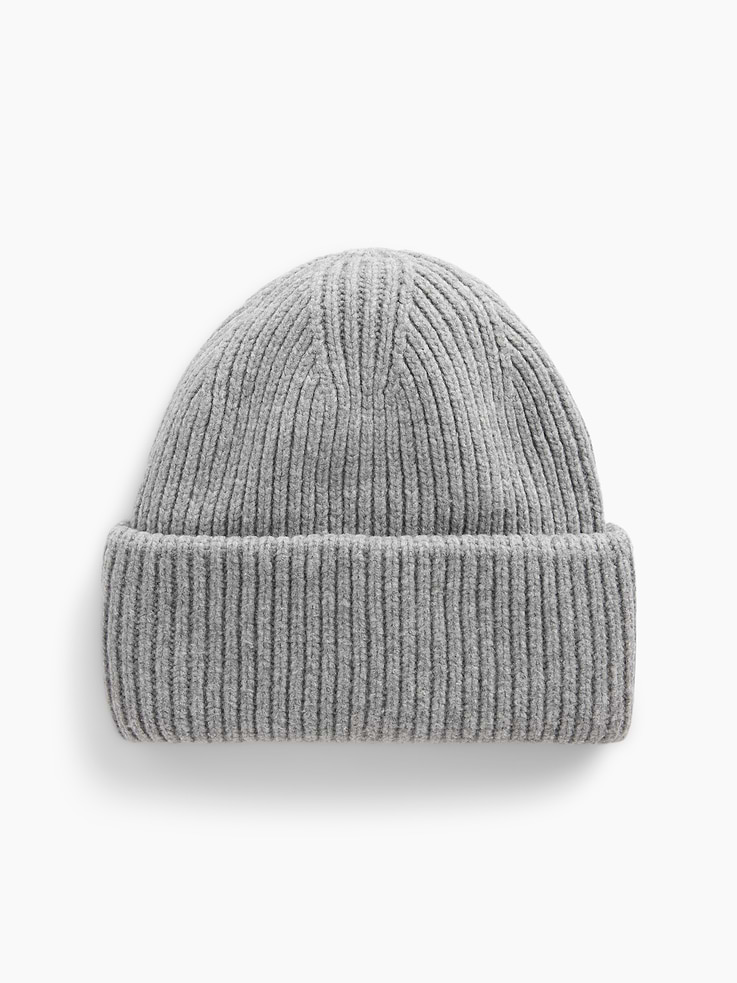 Image 1 of 2, Soft, chunky knit cotton-blend beanie., Rolled brim., This product was made in a factory that invests in gender equity and women’s empowerment through RISE. Learn more at gapinc.com/equity ., Product #1185040