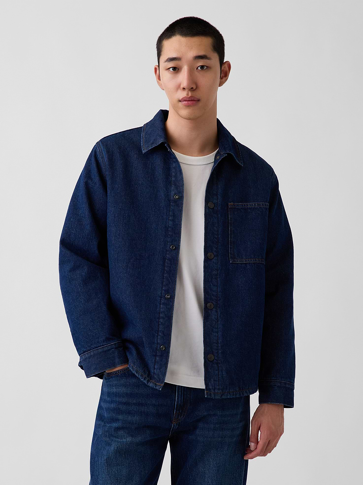Image 1 of 5, Authentic, non-stretch denim shirt jacket. In a relaxed fit., Spread collar, snap button front., Long sleeves with snap button cuffs., Back yoke seam., Chest patch pocket., Straight hem., Dark wash., Quilted plaid lining., Responsibly Made: This denim jacket is part of our water-saving Washwell program. Compared with conventional wash methods, Washwell uses at least 20% less water., This product was made in a factory that invests in gender equity and women’s empowerment through RISE. Learn more at gapinc.com/equity ., Made with 50% Protocol cotton verified by the U.S. Cotton Trust Protocol, a program which works with farms committed to improving their environmental footprint by minimizing water usage and improving soil health (Claim No. 10127)., Made with 5% recycled cotton. Compared to virgin materials, using recycled materials helps reduce resource use and waste., Product #1186549