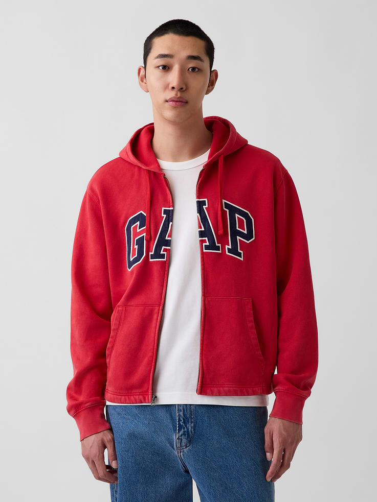 Image 1 of 5, Soft cotton-blend fleece full-zip hoodie. In a relaxed fit., Hooded neckline with drawcords., Long sleeves with drop shoulders and banded rib cuffs., Zipper front., Gap logo at front., Kanga pockets., Straight hem., Made with 52% Protocol cotton verified by the U.S. Cotton Trust Protocol, a program which works with farms committed to improving their environmental footprint by minimizing water usage and improving soil health (Claim No. 10127)., Made with 23% recycled polyester. Compared to virgin materials, using recycled materials helps reduce resource use and waste., This product was made in a factory that invests in gender equity and women’s empowerment through RISE. Learn more at gapinc.com/equity ., Product #1189438