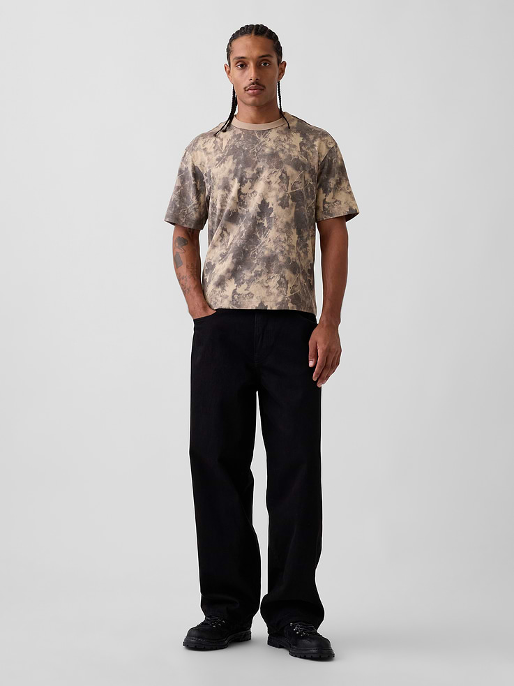 Image 1 of 4, Soft, heavyweight cotton cropped T-shirt., Crewneck., Short sleeves., Explore our GapTees Guide ., This product was made in a factory that invests in gender equity and women’s empowerment through RISE. Learn more at gapinc.com/equity ., Product #715775