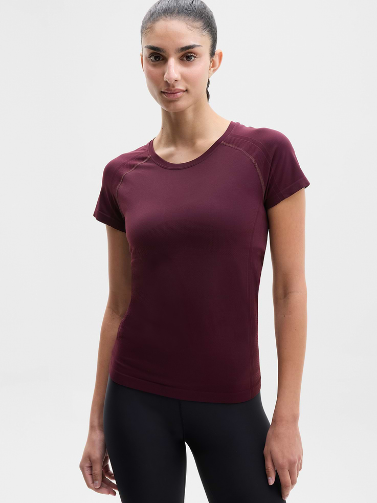 Image 1 of 4, FOR: Medium to high-impact workouts at the gym, studio, or outdoors, FEEL: Enhanced yarns deliver soft stretch and quick recovery, keeping you comfortable while you push your limits, FAVE: The workout top you love, now with upgraded stretch, sweat-wicking power, and sleek style, Seamless construction for minimal chafing, Functional mesh panels allow for optimal movement and breathability, Grippers at inner hem prevent it riding up, Product #845692