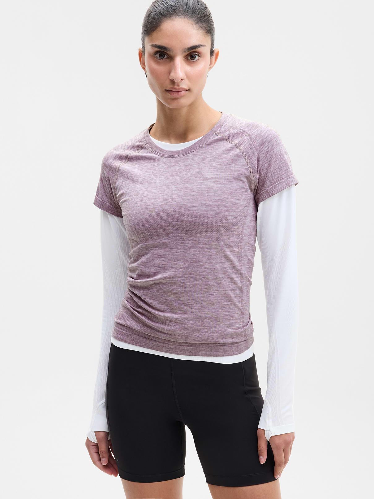 Image 1 of 6, FOR: Medium to high-impact workouts at the gym, studio, or outdoors, FEEL: Enhanced yarns deliver soft stretch and quick recovery, keeping you comfortable while you push your limits, FAVE: The workout top you love, now with upgraded stretch, sweat-wicking power, and sleek style, Seamless construction for minimal chafing, Functional mesh panels allow for optimal movement and breathability, Product #845689