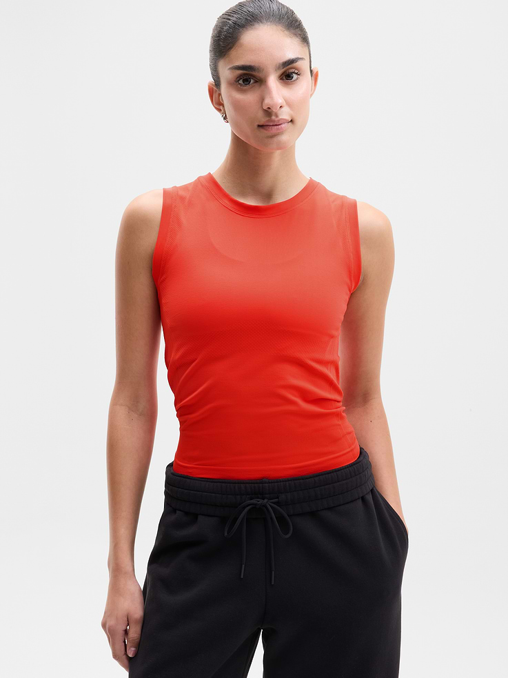 Image 1 of 6, FOR: Medium to high-impact workouts at the gym, studio, or outdoors, FEEL: Enhanced yarns deliver soft stretch and quick recovery, keeping you comfortable while you push your limits, FAVE: The workout top you love, now with upgraded stretch, sweat-wicking power, and sleek style, Seamless construction for minimal chafing, Functional mesh panels allow for optimal movement and breathability, Grippers at inner hem prevent it riding up, Product #845579