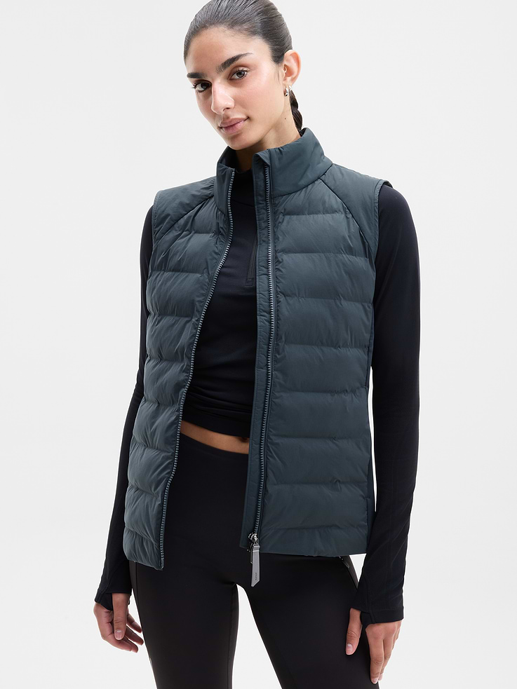Image 1 of 6, FOR: Training in cold weather climates, FEEL: PrimaLoft® insulated body with a cozy, brushed lining, FAVE: Your favorite cold-weather layer, upgraded for the season with modern seam lines and an Aqua Guard zipper for more warmth and weather protection, Secure zip pockets, Product #768928