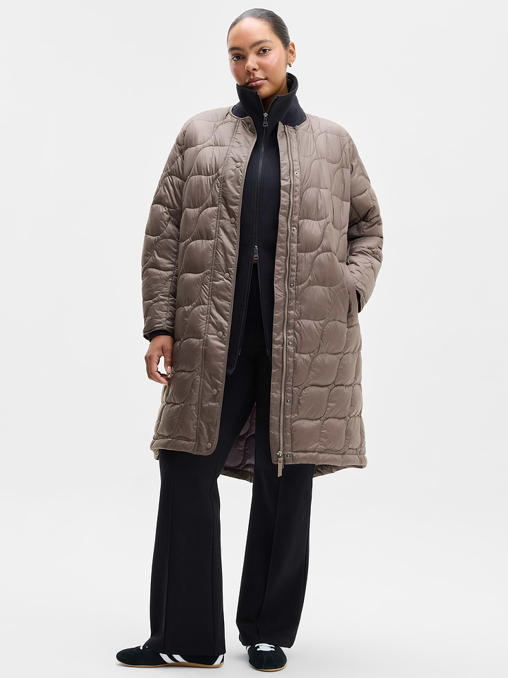 Image 1 of 6, FOR: Commuting, work, and travel, FEEL: Smooth and sleek with lightweight insulation that delivers just-right warmth, FAVE: Longer length for added warmth, Product #1179394