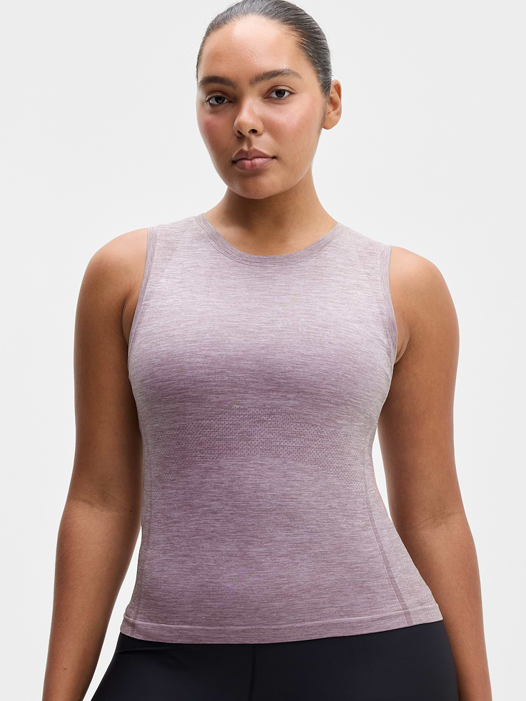Image 1 of 6, FOR: Medium to high-impact workouts at the gym, studio, or outdoors, FEEL: Enhanced yarns deliver soft stretch and quick recovery, keeping you comfortable while you push your limits, FAVE: The workout top you love, now with upgraded stretch, sweat-wicking power, and sleek style, Seamless construction for minimal chafing, Functional mesh panels allow for optimal movement and breathability, Product #860887