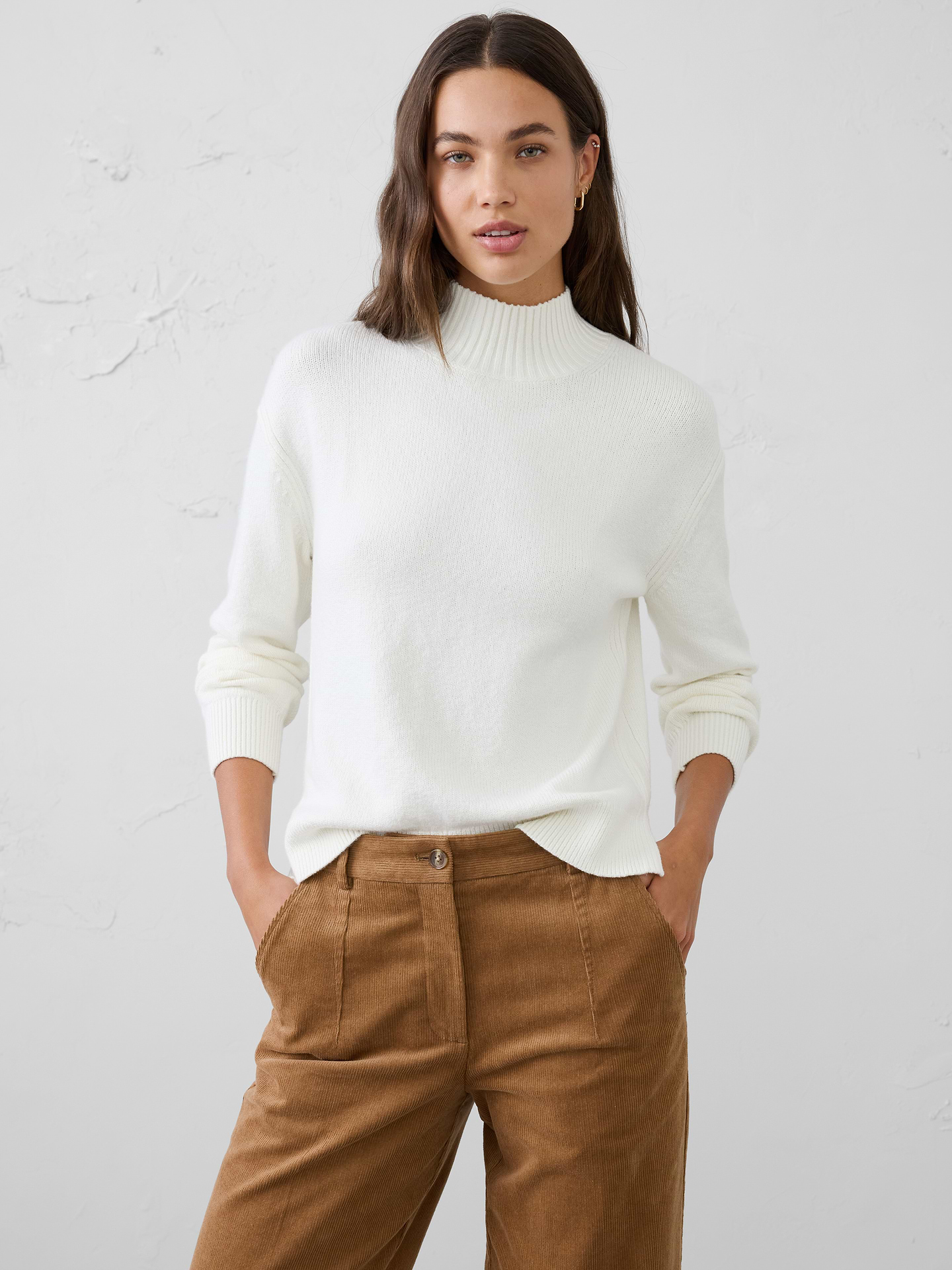 Image 1 of 3, Designed to be a go‑to layering essential, this sweater offers a soft, warm hand feel with lightweight comfort that never feels bulky. Cozy and versatile, it's perfect for transitional weather, whether worn on its own or layered under jackets and outerwear. Effortlessly polished and easy to style, it's a piece you'll reach for season after season., Mock neckline. Long sleeves., Drop shoulders., Ribbed neckline, arm cuffs and hem., Side seam slits at hem., Made exclusively for Banana Republic Factory., Product #1177078