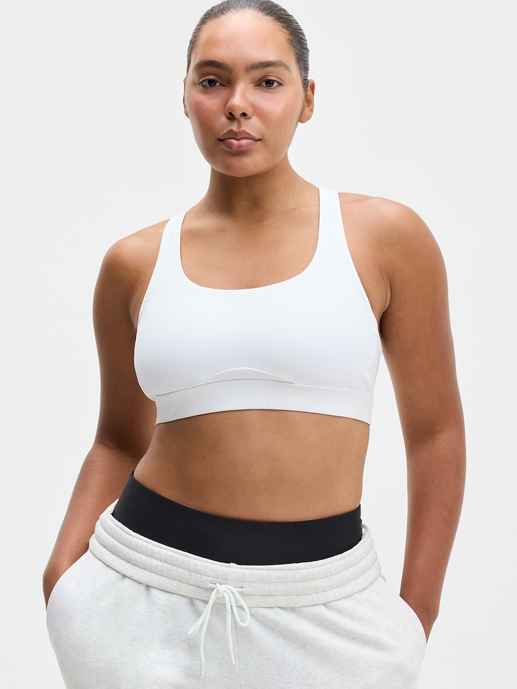 Image 1 of 4, BEST FOR CARDIO: run + train + HIIT, IMPACT: Medium-impact workouts, best for A-C cups, FEEL: PowerMove fabric is sleek, weightless, and helps keep you cool with quick-drying properties, FAVE: Stay-put straps and shaping seams for a secure, sculpted fit, Built-in pockets with removable pads for optional coverage, Removable pads hold their shape from wash to wear, Lined with PowerMesh for breathable, sheer-proof coverage, Easily pairs with the Empower Mastectomy Bra Insert, Product #413272