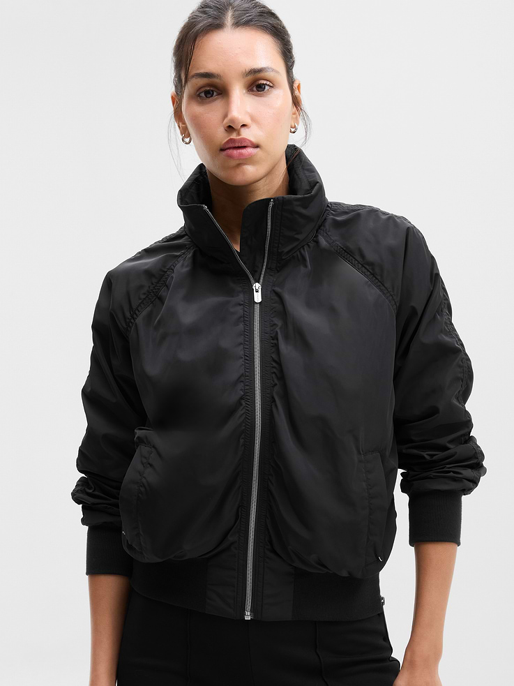 Image 1 of 4, FOR: Your workday commute and weekend travels, from meetings to meetups, FEEL: Recycled polyester fabrication is sleek with a soft hand-feel, FAVE: Stowable hood for changes in weather, Secure zip pockets to store your essentials, Side zipper detail allows for freedom of movement, Product #818839