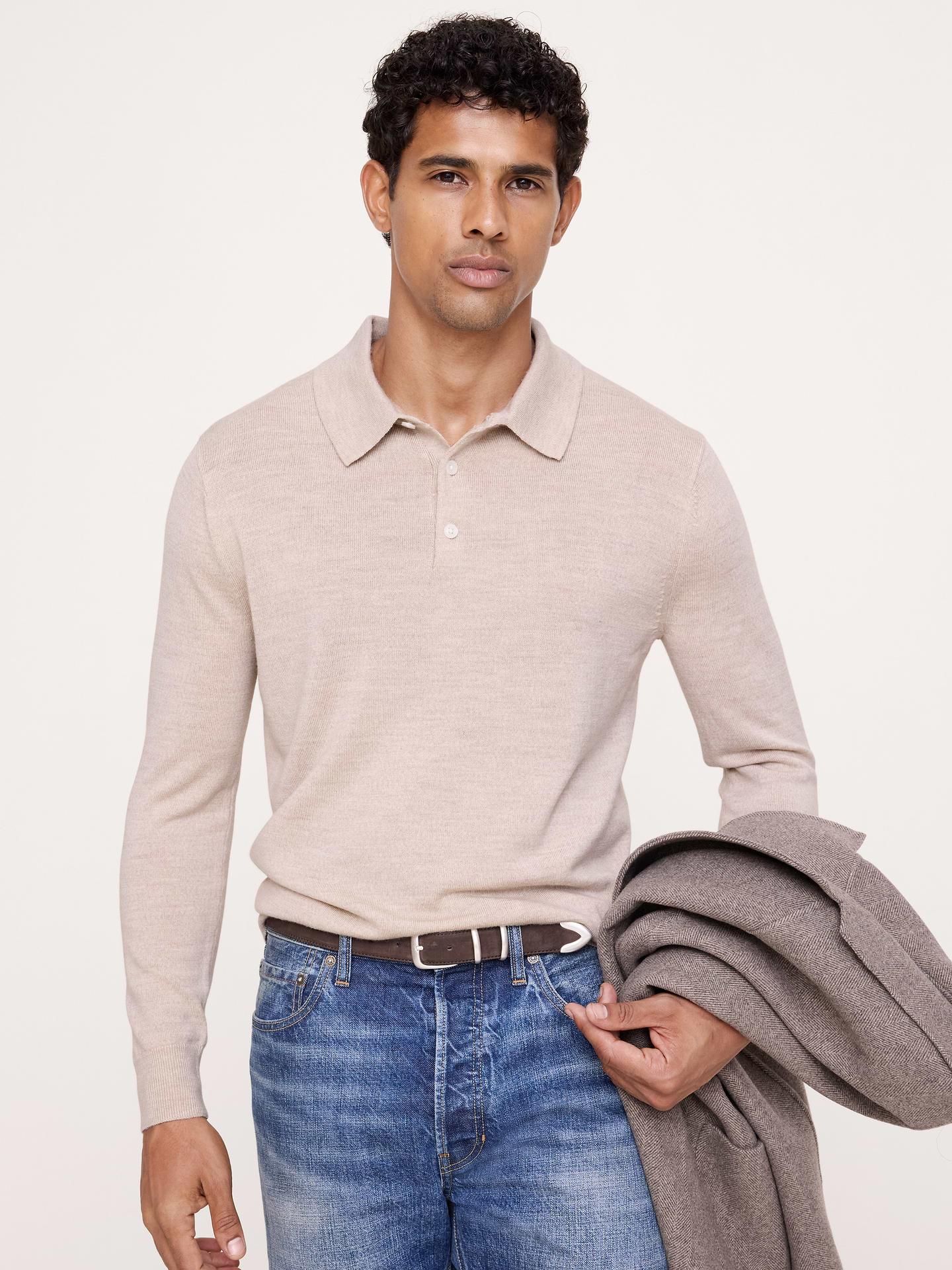 Image 1 of 5, Looks good, feels good. A timeless polo, crafted in beautifully warm and soft Merino wool., Standard fit: A straight and easy fit., Polo collar with button placket., Straight hem., Product #914161