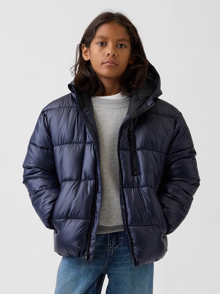 Image 1 of 5, Water-repellent ripstop heavyweight puffer jacket. In a relaxed fit., Hooded neckline., Long sleeves with drop shoulders and elasticized cuffs., Zipper front., Vertical zip pocket at chest, welt pockets at lower front., Made with 100% recycled polyester. Compared to virgin materials, using recycled materials helps reduce resource use and waste., Product #909130