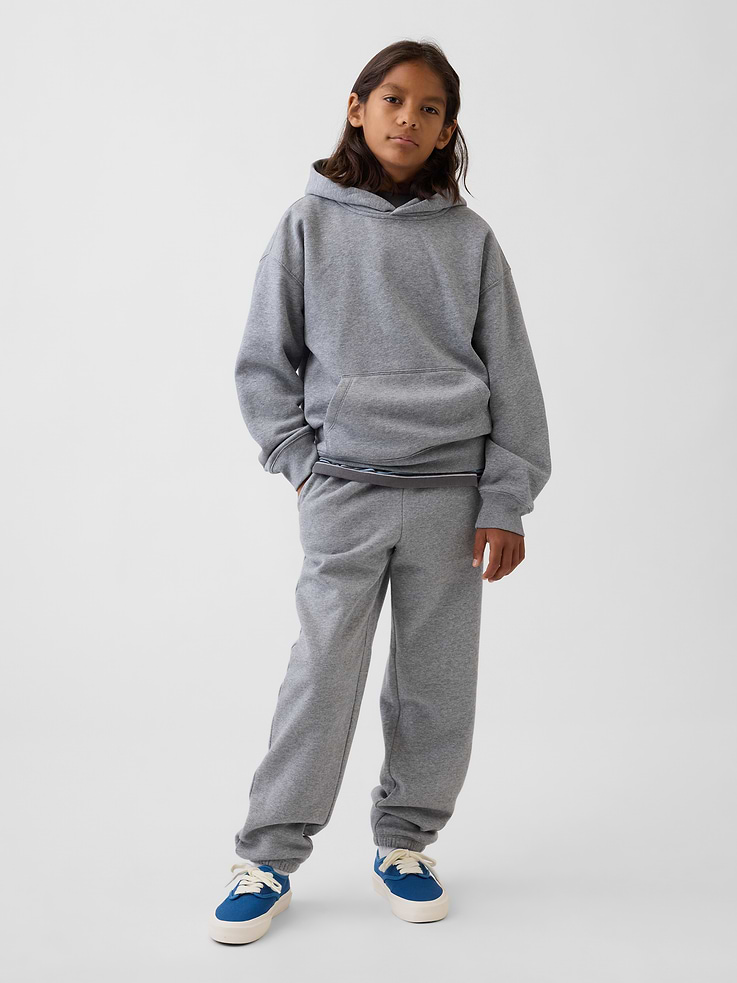 Image 1 of 5, Our softer than soft sweats. Brushed on the inside. Smooth on the outside. Made so that no two are alike., Soft cotton-blend fleece joggers. In a relaxed fit., Elasticized waist with inner drawcords., Side on-seam pockets, back patch pocket., Elasticized cuffs., Certain styles have the Gap logo at front., Made with 23% recycled polyester. Compared to virgin materials, using recycled materials helps reduce resource use and waste., Product #915489