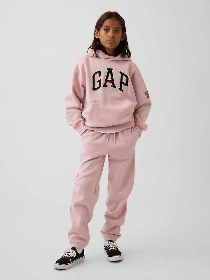 Image 1 of 5, Our softer than soft sweats. Brushed on the inside. Smooth on the outside. Made so that no two are alike., Soft cotton-blend fleece joggers. In a relaxed fit., Elasticized waist with inner drawcords., Side on-seam pockets, back patch pocket., Elasticized cuffs., Certain styles have the Gap logo at front., Made with 23% recycled polyester. Compared to virgin materials, using recycled materials helps reduce resource use and waste., Product #915489